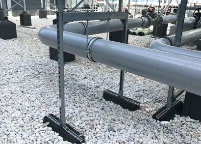 1 Sistema di supporto per tubi pesanti su tetti piani