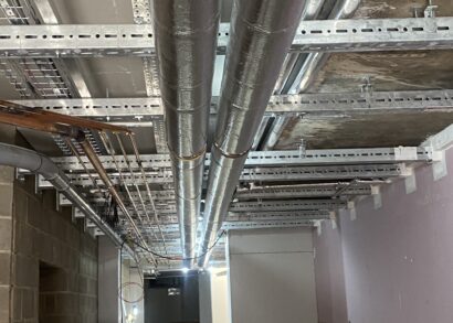Multi-service bracketry for a hospital M&E renovation